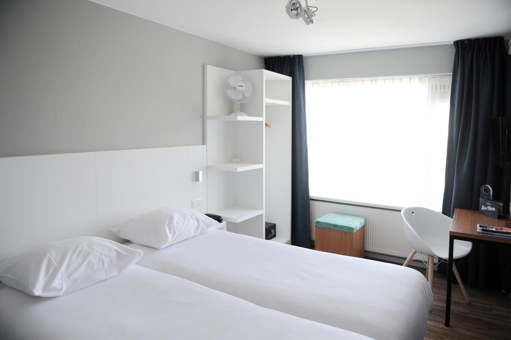 Hotel Andante Aan Zee Хага Стая снимка