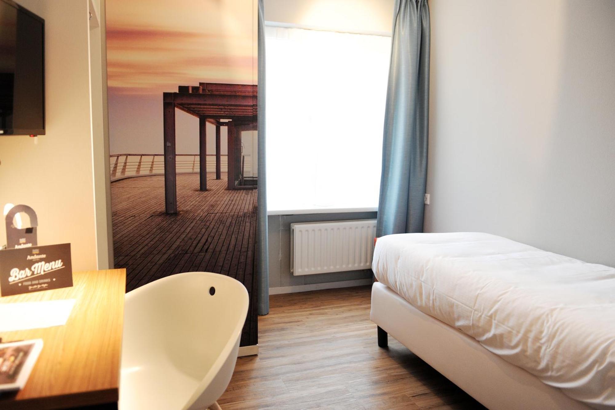 Hotel Andante Aan Zee Хага Стая снимка